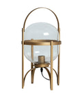 Lámpara de mesa Vische con estructura de hierro dorado y pantalla esférica de cristal, estilo moderno y elegante.