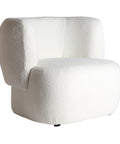 Sillón Bats Bouclé tapizado en algodón bouclé con estructura de madera de pino, diseño ergonómico y acogedor para cualquier espacio.