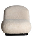 Sillón Lenax tapizado en algodón bouclé con estructura de madera de pino, diseño elegante y confortable para cualquier espacio.